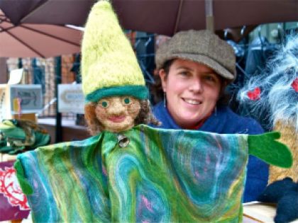Amy Godard shows her puppets, salves, and folk art at the Lithia Artisans Market of Ashland. 