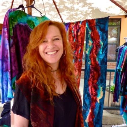 Marcella Ruikis, Hand Painted Silk Art, at Lithia Artisans Market of Ashland, Oregon. Marcella and her mom, Susan, make fabulous, richly died and hand painted silk scarves. Yummy!